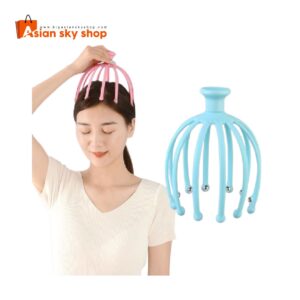 Close-up of stainless steel prongs and soft beads of scalp massager